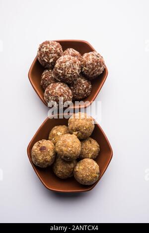 Gruppo di Dink, Gond , Aliv, Halim laddu, Laddoo, Ladu, Ladoo fatto con semi di grezza da giardino e gomma commestibile, cibo dolce Foto Stock