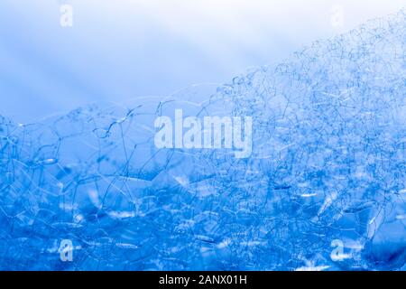 Creative sfondo astratta fatta di catena di struttura bolle nei toni del blu Foto Stock