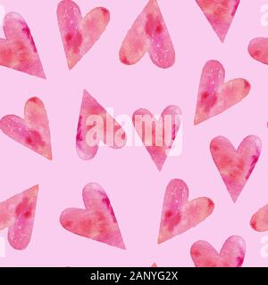 Acquerello seamless pattern o una texture con cuori su sfondo rosa. Il concetto di amore e il giorno di san valentino gli elementi di design. Disegnata a mano illustrazione. Foto Stock