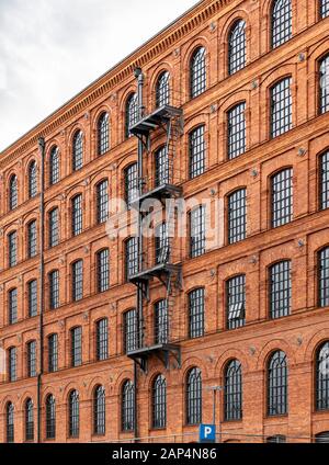 Manfaktura è enorme centro commerciale e di intrattenimento con la ex-fabbrica di proprietà di Israele Poznański factory di Łódź, Polonia. Foto Stock