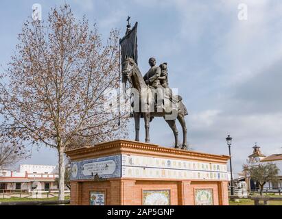 Monumento di una coppia in pellegrinaggio a cavallo, El Rocío, Almonte, Huelva, Andalusia, Spagna Foto Stock