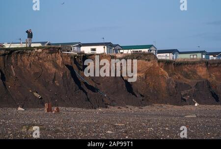 Case sulla costa di Skipsea, East Ridings of Yorkshire, dove i consiglieri sono impostati per discutere l'effetto 'evastating' di erosione che vedrà decine di persone a Skipsea perdere le loro case al mare sulla costa più rapida scomparsa in Nord Ovest Europa. Foto Stock