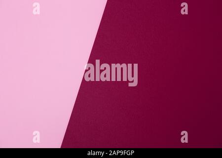 Bello sfondo luminoso a due toni di tonalità rosa e Borgogna, colori Foto Stock