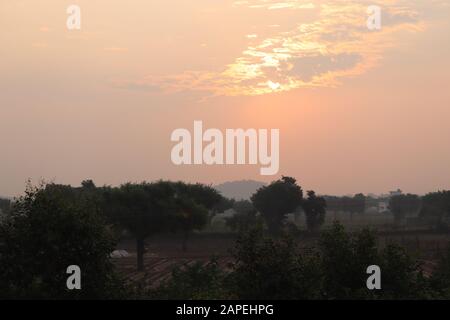 Landscape, sunny dawn in a field Foto Stock