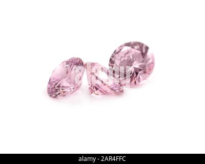 Pietre rosa morganite su sfondo bianco. Foto Stock