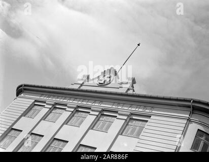 Islanda Reykjavik. Facciata della Compagnia islandese del vapore Annotazione: Durante la riprogettazione dell'edificio in un hotel, il roset con la swastika è stato sostituito dal logo dell'hotel Data: 1934 posizione: Islanda, Reykjavik Parole Chiave: Architettura, swastika, uffici, finestre, spedizione Foto Stock