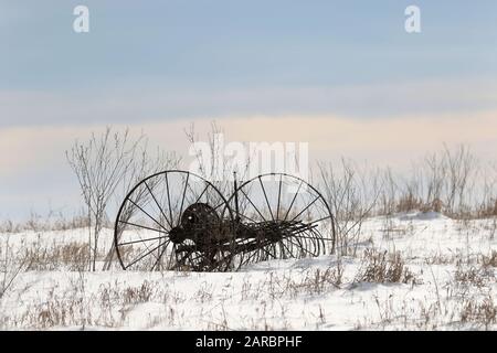 Macchine agricole nella neve Foto Stock