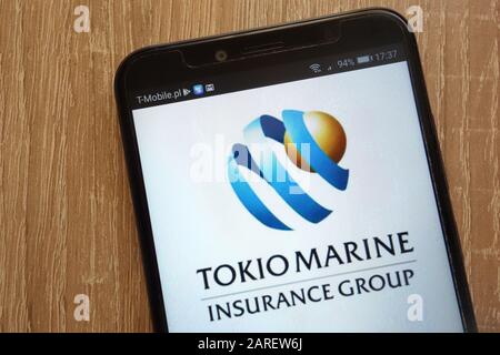 Logo Tokio Marine Insurance Group visualizzato su uno smartphone moderno Foto Stock