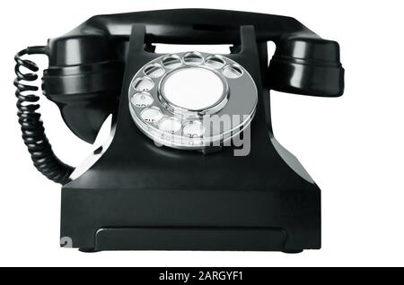 Un vecchio telefono bakelite britannico circa 1940s, isolato su uno sfondo bianco. Immagine in bianco e nero (scala di grigi). Foto Stock