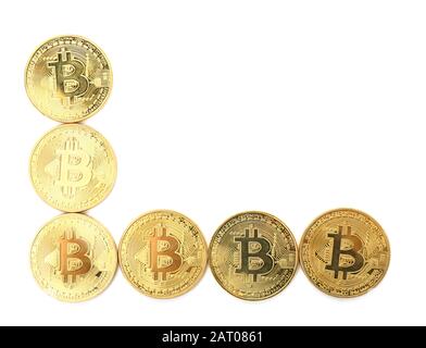 Golden bitcoins su sfondo bianco Foto Stock