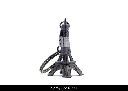 Pendente della Torre Eiffel nera su sfondo bianco Foto Stock
