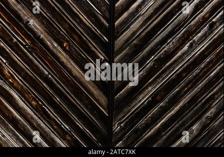 Quercia vecchia marrone scuro grunge naturale vintage legno sfondo.diagonale tavole. Foto Stock
