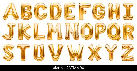 Alfabeto inglese fatto di palloncini d'elio gonfiabili dorati isolati su bianco. Font a palloncino in lamina d'oro, set completo di lettere maiuscole. Foto Stock