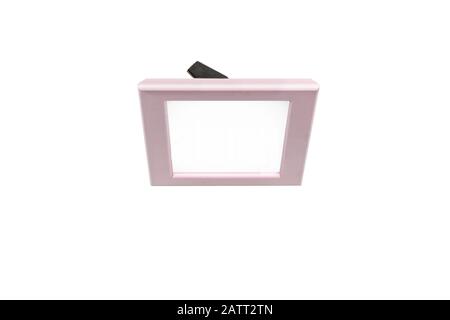 Cornice rosa su sfondo bianco. Cornice rosa vuota. Foto Stock