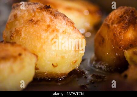 patate arrosto Foto Stock