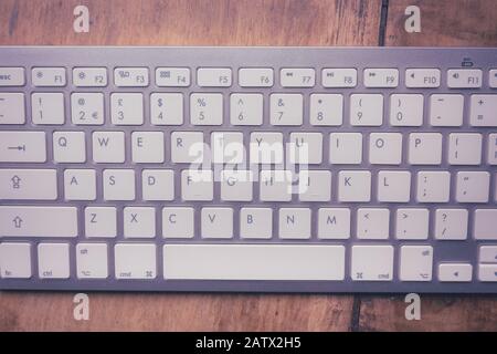 Tastiera per computer wireless portatile. Immagine in stile vintage Foto Stock