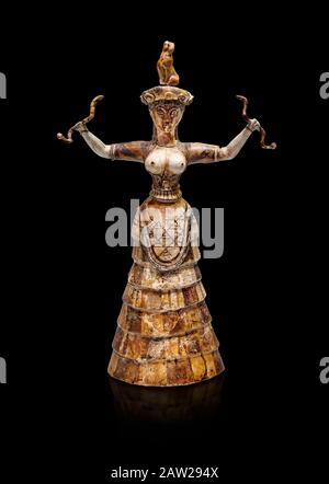 Minoan Snake Goddess statua braccia alzate tenendo 2 serpenti dal Tempio di Cnosso-Repositories 1650-1550 a.C., Museo Archeologico di Heraklion, nero b. Foto Stock