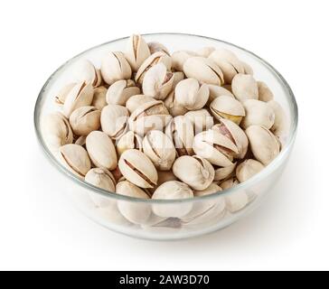 Pistacchi salati in recipiente di vetro isolato su sfondo bianco con tracciato di ritaglio Foto Stock