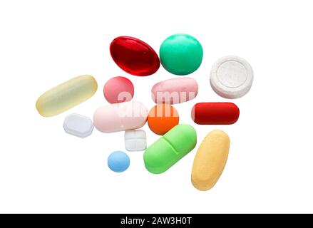 Pillole, compresse isolate su uno sfondo bianco. Pillole di medicina colorate. Foto Stock