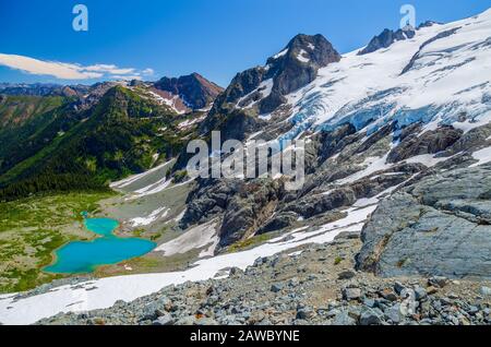 Il paesaggio lungo la traversa di Ptarmigan è tra i migliori del Nord America. Mentre è impegnativo, questo itinerario alpinistico vale bene lo sforzo. Foto Stock