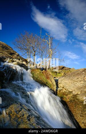 Comb Beck Waterfalls a Buttermere nel Lake District, Cumbria. Foto Stock