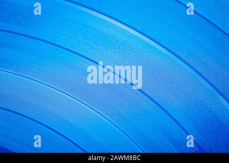 Close up blu superficie vinilica. Blue vinile texture dello sfondo. Close up di LP in vinile record mostra scanalature Foto Stock