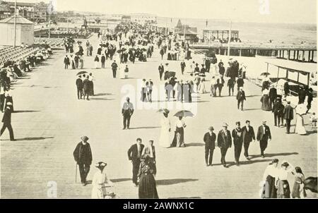 Asbury Park E Ocean Grove. L'AVVICINARSI STURM.Here sono mostrate le nuvole abbassanti e le onde che battono pesantemente sulla spiaggia. È una scena con cui i patroni ol un resort di costa suininei hanno familiarità e richiede soltanto un'immaginazione vivida per immaginare accuratamente nella mente. Sul LUNGOMARE. Qui vediamo la famosa spianata di Asburys in grassetto rilievo. L'Asbury Park Boardwalk bas è stato r»> spesso descritto u< richiede commento. Sulla sua ampia superficie, che si estende per un miglio lungo il fronte oceano, in una calda giornata estiva sono spesso concentrati 50.000 Promenaders, mentre sulle serate di gala può l Foto Stock