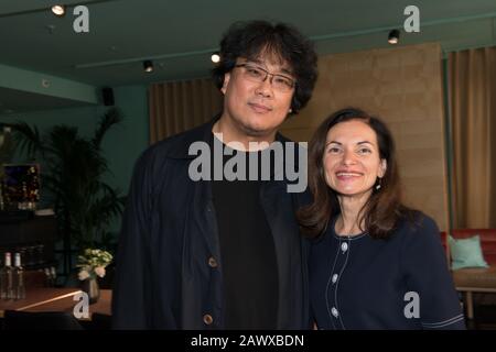 Il regista vincitore dell'Oscar Bong Joon ho visto alla reception di Filmfest München nel luglio 2019 con Elena Diesbach, Foto Stock