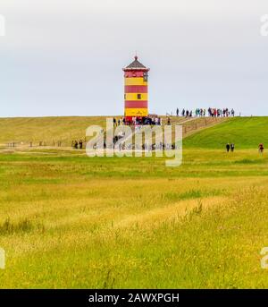 Il faro di Pilsum intorno Krummhoern in Frisia orientale, Germania Foto Stock