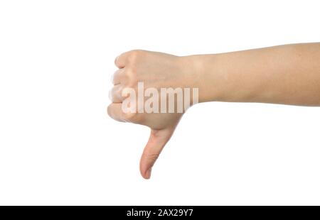 Pollice femmina giù, isolato su sfondo bianco Foto Stock