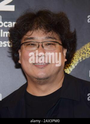 Milano, Italia. 10th Feb, 2020. Locarno, Svizzera Locarno Film Festival 2019 Svizzera, Red carpet Per Il Parassita del film del regista BONG Joon-ho, CANZONE Kang-ho attore riceve il premio Excellence nella foto: Direttore BONG Joon-ho Credit: Agenzia indipendente Foto/Alamy Live News Foto Stock
