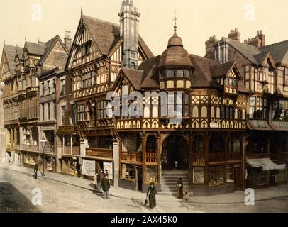 1890 ca , CHESTER, Cheshire , INGHILTERRA , GRAN BRETAGNA : la Croce e File . Photocrom print by Detroit Publishing Co. - GRAND BRETAGNA - VIEW - English Midlands - FOTO STORICHE - STORIA - GEOGRAFIA - GEOGRAFIA - ARCHITETTURA - ARCHITETTURA - CASA - HOME - ARCHITETTURA - ARCHITETTURA - STRADA - BELLE EPOQUE - negozi - negozizi - negozio ----- Archivio GBB Foto Stock