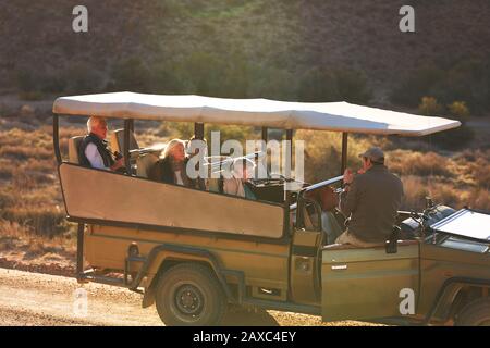 Guida turistica Safari e gruppo in fuoristrada Foto Stock