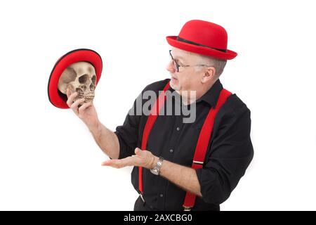 Un animatore di bambini con un cranio umano Foto Stock