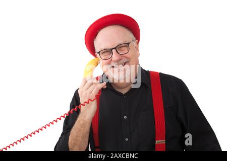 Un animatore di bambini che fa trucchi Foto Stock