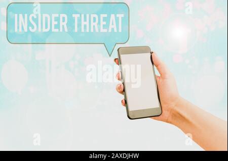 Scrivere A Mano Il Testo Insider Threat. Minaccia concettuale per la protezione delle foto che proviene dall'interno dell'organizzazione Foto Stock