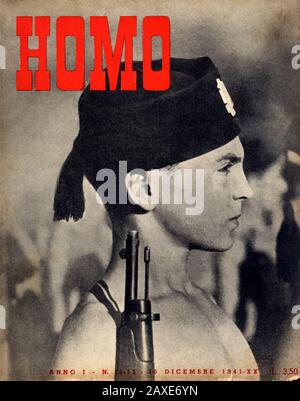 1941 , ITALIA : la rivista italiana d'illustrazione fascista HOMO con un piccolo BALILLA MOSCHETTIERE a copertina, 30 dicembre 1941 - ritratto - POLITICA - POLITICO - ITALIA - POLITICA - ritratto - ITALIA - FASCISMO - FASCISMO - FASCISTA - PROPAGANDA - ITALIA - ANNI QUARANTA - '40 - 40's - Copertina - rivista illustrata - bambino - bambini - bambini - Bambino - infanzia - infanzia - indottrinamento uniforme militare - divisa militare uniforme - WW 2nd - WWII - SECONDA GUERRA Mondiale - FEZ - CAMP gay interessi gusto involontario - STORIA - FOTO STORICHE - Profilo - libro Foto Stock