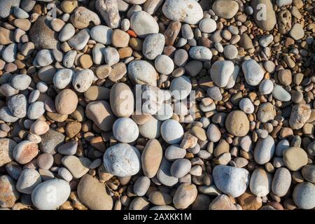 Uno sfondo con un sacco di pietre per risorsa grafica Foto Stock