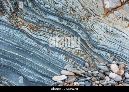 Ciottoli e struttura rocciosa a Costa Verde, Spagna, Playa del Silencio, Asturie, Spagna settentrionale, Foto Stock