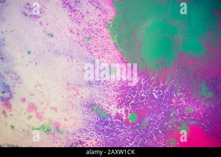 Macchie colorate, gocce, schizzi, miscelazione. Astratto sfondo colorato Foto Stock