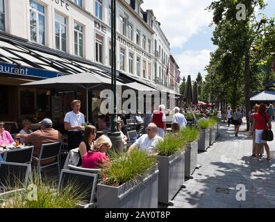 Turisti in caffè di strada Foto Stock