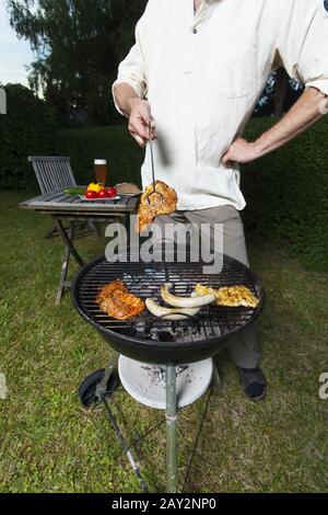 Barbecue in giardino Foto Stock