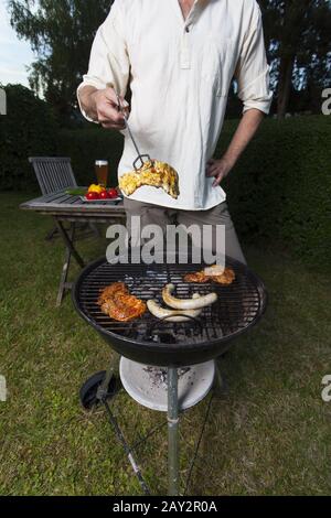 Barbecue in giardino Foto Stock