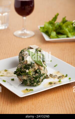 Strangolapreti, gnocchi di spinaci italiani Foto Stock