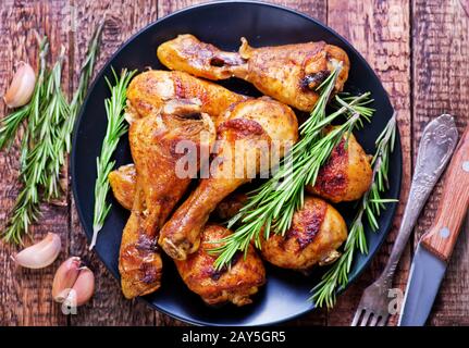 Frittura di cosce di pollo Foto Stock