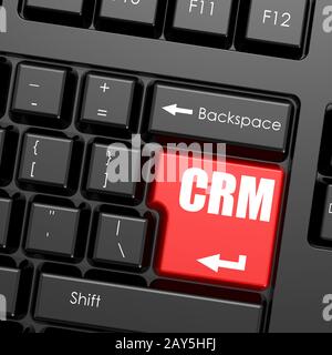 Rosso pulsante invio sulla tastiera del computer, parola di CRM Foto Stock