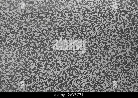 Trama metallica chiazzata corrosa su un foglio di alluminio, trattato con acido. Foto Stock