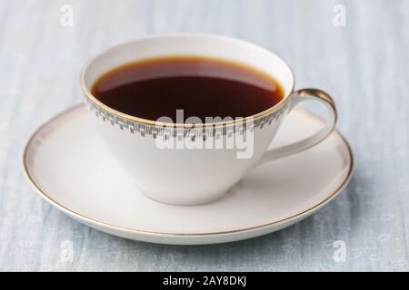 Tazza di caffè in una tazza vecchia Foto Stock