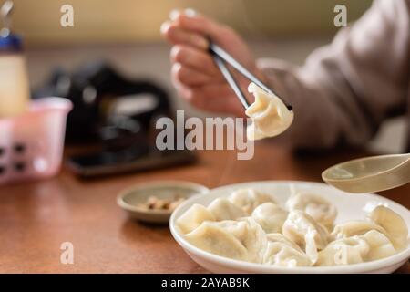 gnocchi jiaozi bolliti Foto Stock