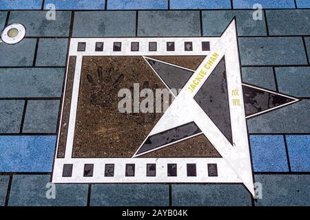 Stampa di palme di Jackie Chan sulla Avenue of Stars, Hong Kong Foto Stock